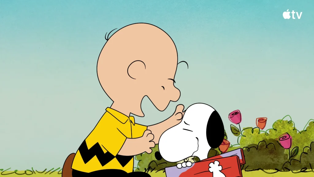 Charlie Brown hugging a sad Snoopy during the search for his missing doghouse