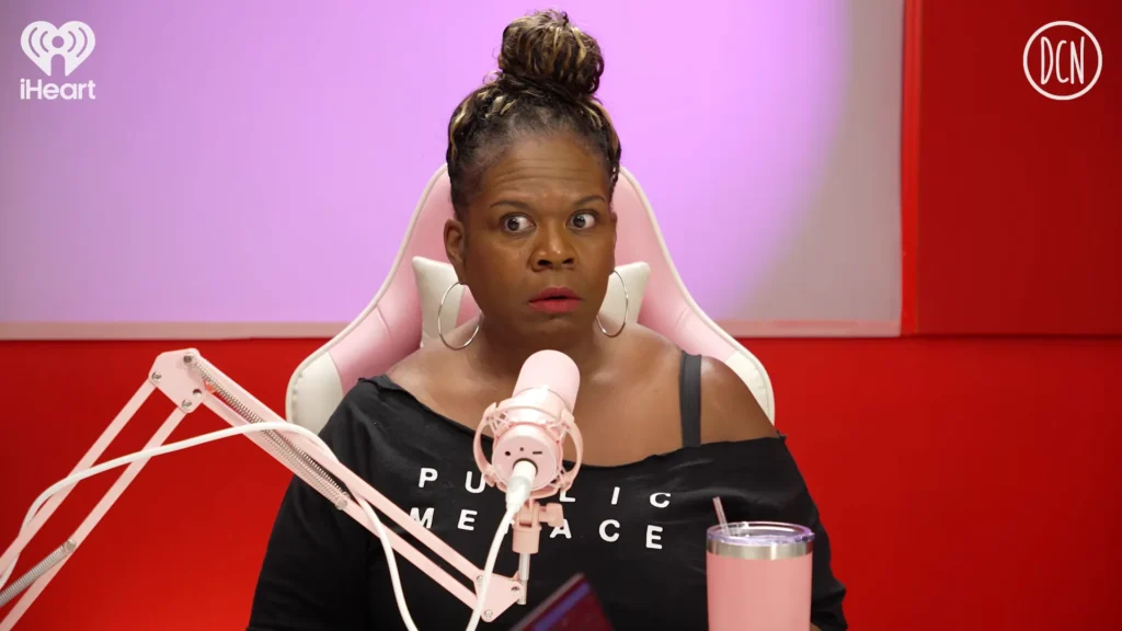 Yamaneika Saunders reacts while answering a listener relationship question on her new podcast
