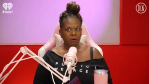 Yamaneika Saunders reacts while answering a listener relationship question on You’re the Problem