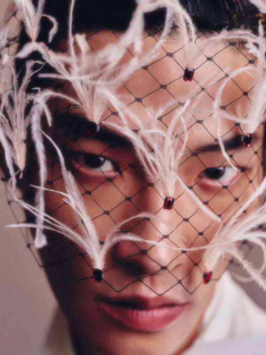 Ahn Jaehyung poses in a fashion editorial portrait photographed by Lee Seungjae.