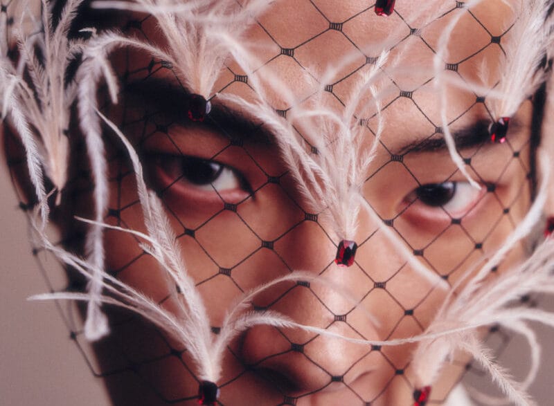 Ahn Jaehyung poses in a fashion editorial portrait photographed by Lee Seungjae.