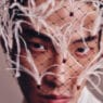 Ahn Jaehyung poses in a fashion editorial portrait photographed by Lee Seungjae.