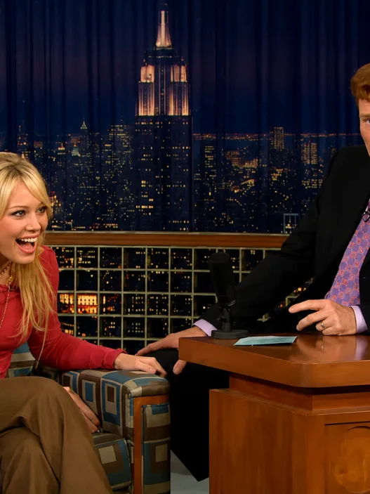 Hilary Duff laughing during her Late Night interview with Conan O’Brien