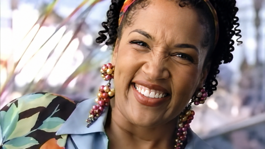 Kym Whitley smiles during the rooftop scene in her 1994 Pringles Double Stacks commercial