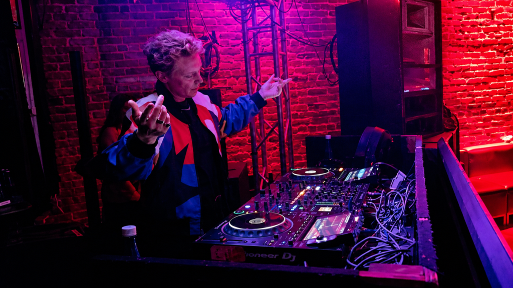 La Roux singer Elly Jackson performing a DJ set under red lighting at The Loft at Catch One in Los Angeles
