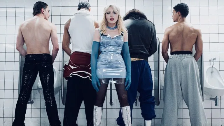 Madonna surrounded by the eclectic cast filming the Danceteria sequence for Confessions II: The Film