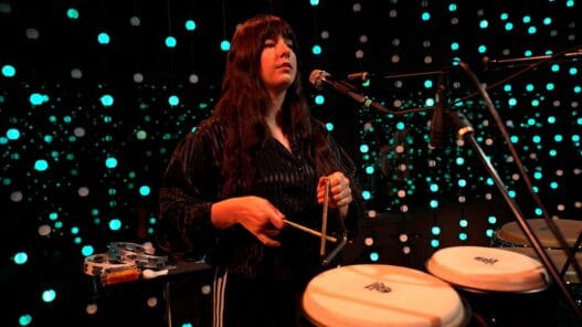 Brijean Murphy sings and plays percussion during Workin’ On It live on KEXP.