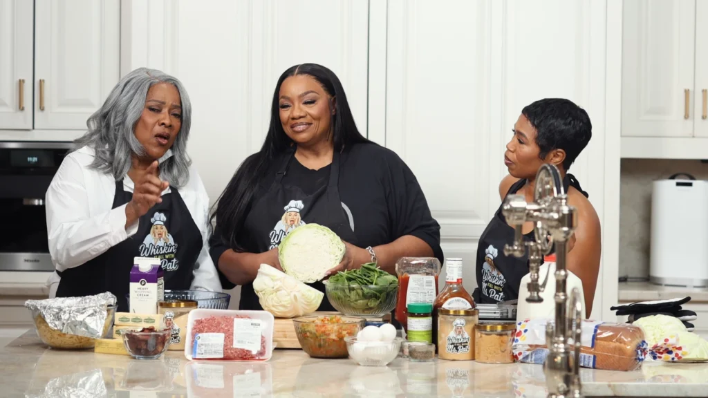 Loretta Devine giving Danni Rose side-eye during the cooking lesson