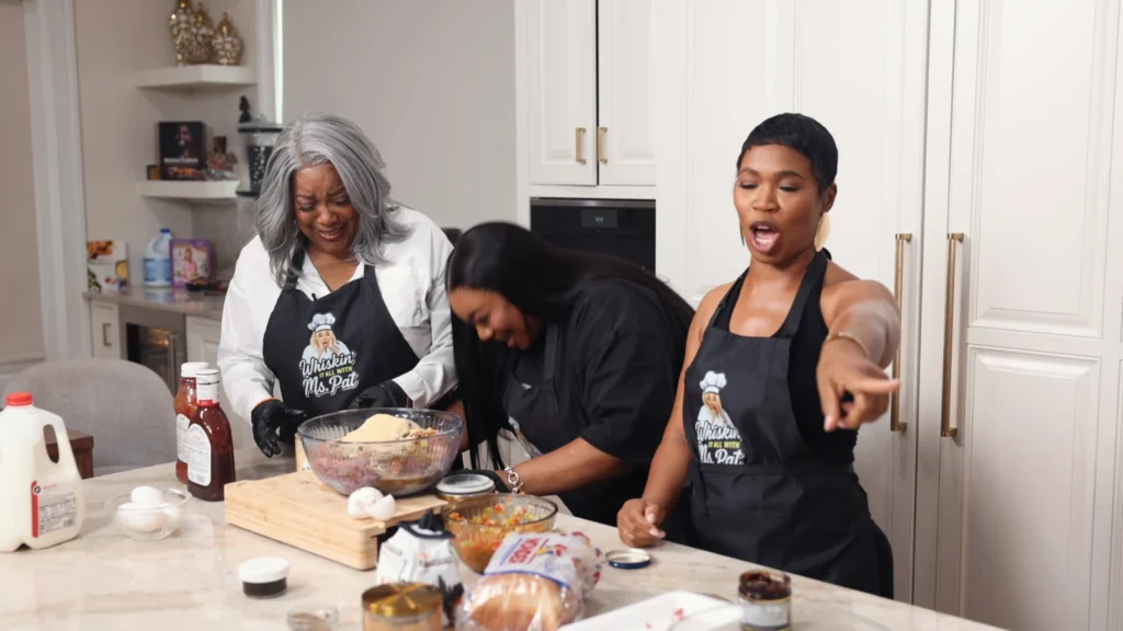 Miss Pat, Loretta Devine and Danni Rose preparing meatloaf together