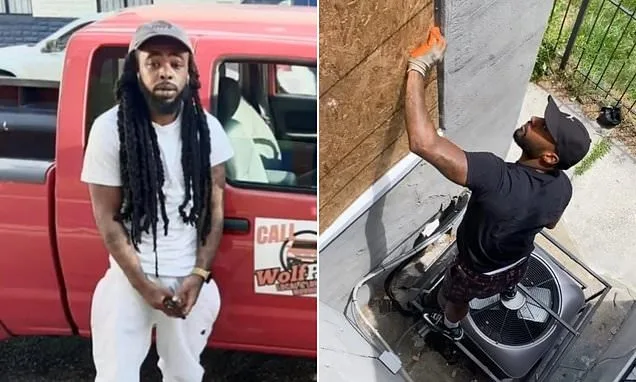 Sanchez Deandre Lewis standing outside a boarded Baltimore property