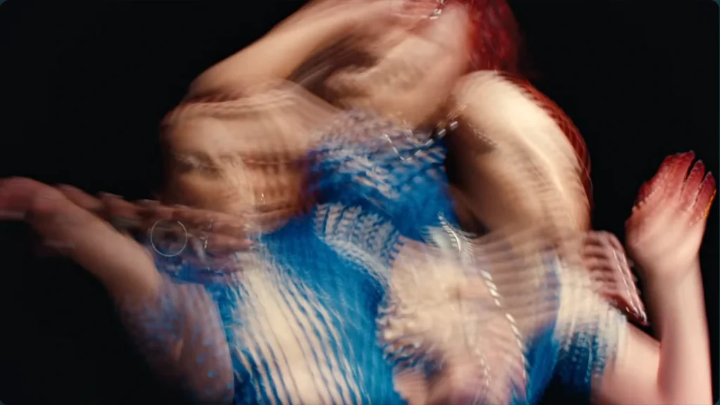 Rose Gray performing in the official visual for Ecstasy