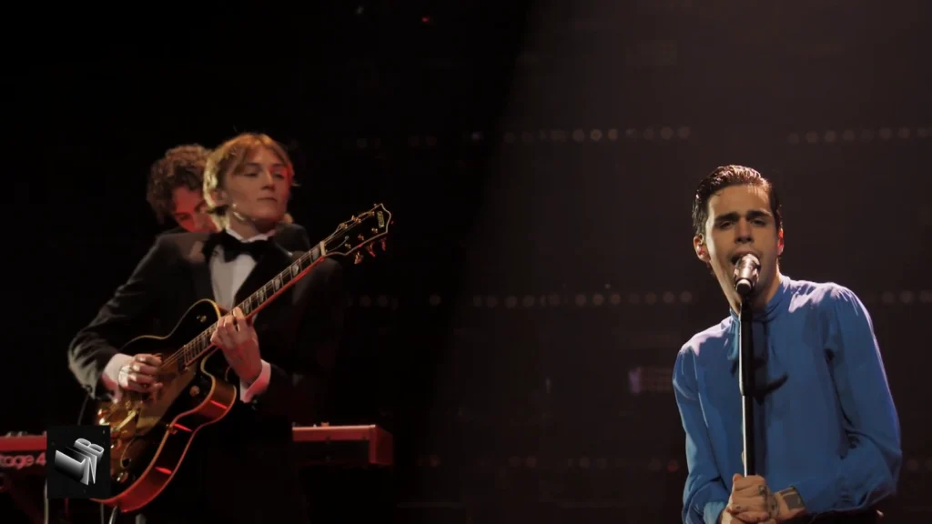 Stephen Sanchez singing into a vintage-style microphone during his Late Night Berlin performance