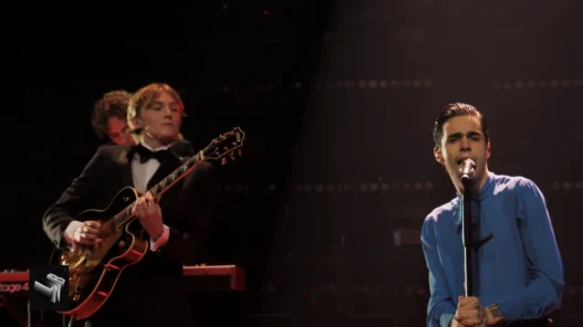 Stephen Sanchez singing into a vintage-style microphone during his Late Night Berlin performance