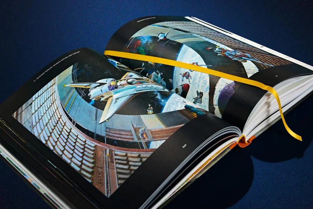 Close-up of the open Lucas Museum of Narrative Art book showing a large spacecraft image across the pages.