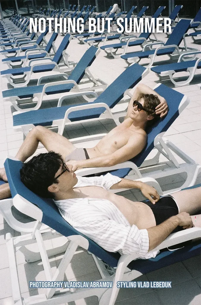Two models reclining on pool loungers beneath the Nothing But Summer editorial title