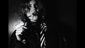 Blue Violet in imagery accompanying the “Sweet Success” official music video