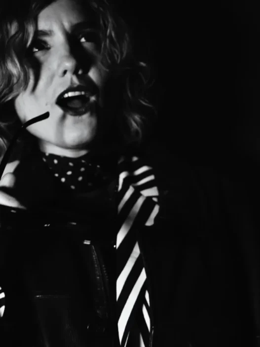 Blue Violet in imagery accompanying the “Sweet Success” official music video