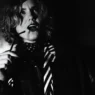 Blue Violet in imagery accompanying the “Sweet Success” official music video
