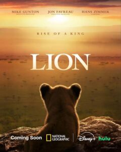 Lion cub Kio resting in greenery on the official trailer artwork for National Geographic’s LION