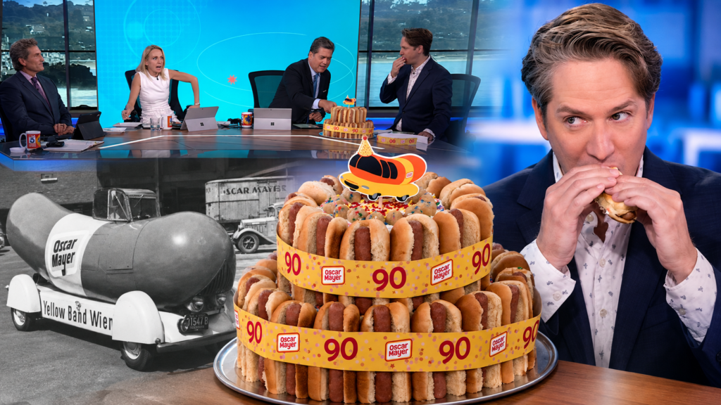 KTLA Morning News hosts celebrate Oscar Mayer’s Wienermobile 90th birthday with a hot dog cake and a vintage Wienermobile image