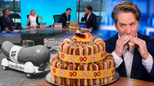 KTLA Morning News hosts celebrate Oscar Mayer’s Wienermobile 90th birthday with a hot dog cake and a vintage Wienermobile image