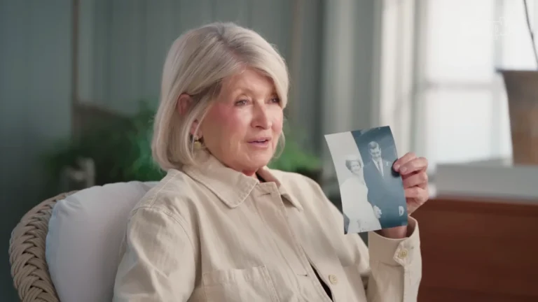 Martha Stewart looking back at photographs from her life and career for PEOPLE