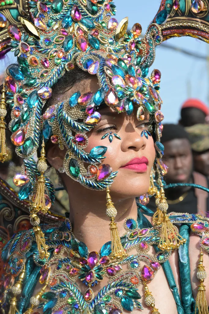 Rihanna in a multicolored feathered costume at Grand Kadooment 2026