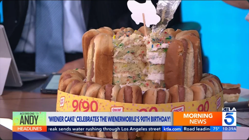 Still from KTLA’s Wienermobile 90th birthday segment