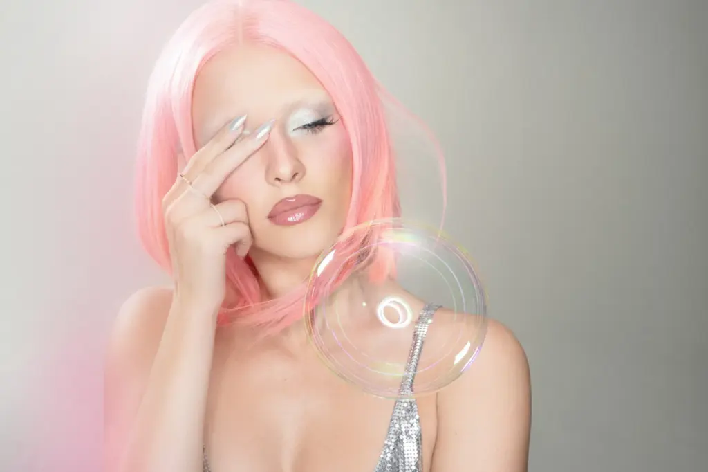 Zara Larsson in Allure's pink-haired cover editorial