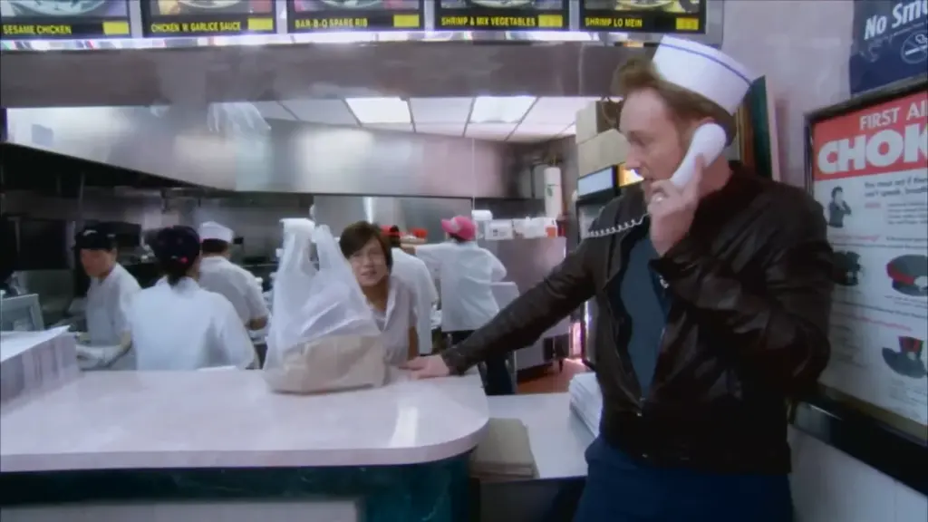 Conan O’Brien carrying out a Chinese food delivery during his 2011 New York remote