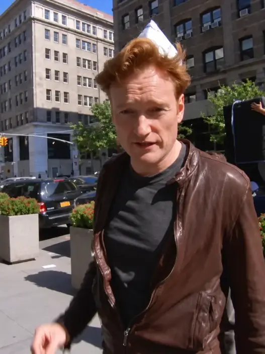 Conan O’Brien walking through New York City during his 2011 Chinese food delivery remote for CONAN