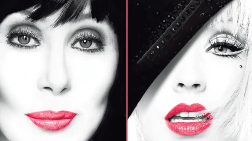 Cher and Christina Aguilera in a story celebrating Burlesque streaming on Hulu