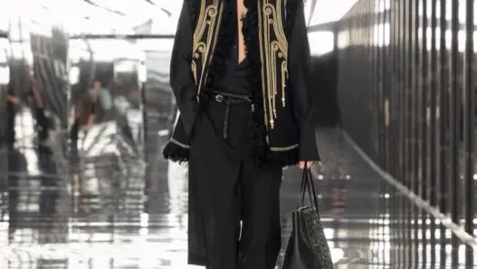 Fendi Spring Summer 2027 menswear look with long coat, fur stole and shorts
