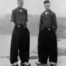 Dutch fishermen in traditional regional clothing with wide trousers