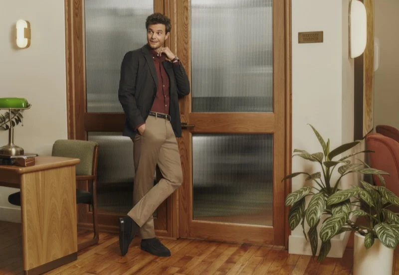 Jack Quaid in charcoal blazer and burgundy shirt for Bonobos Fall 2026