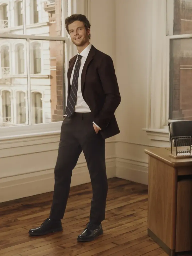 Jack Quaid in charcoal blazer during Bonobos Fall 2026 campaign