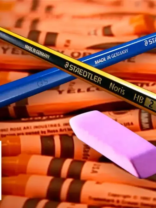 Art supplies being manufactured in a video showing how crayons, colored pencils and other familiar materials are made