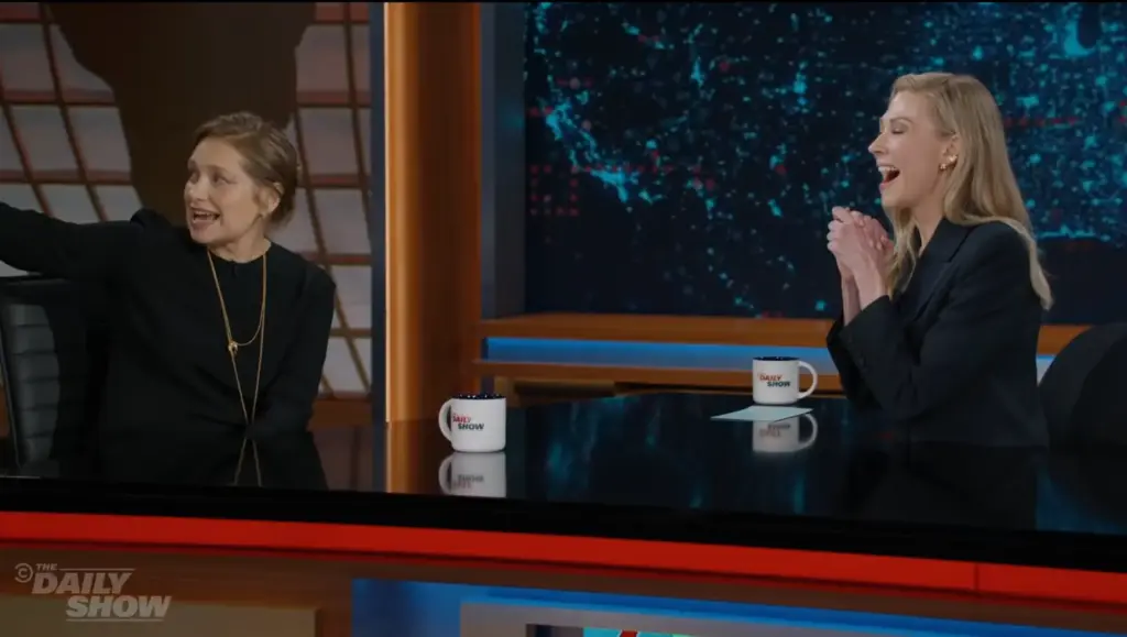 Merritt Wever speaking with Desi Lydic on The Daily Show