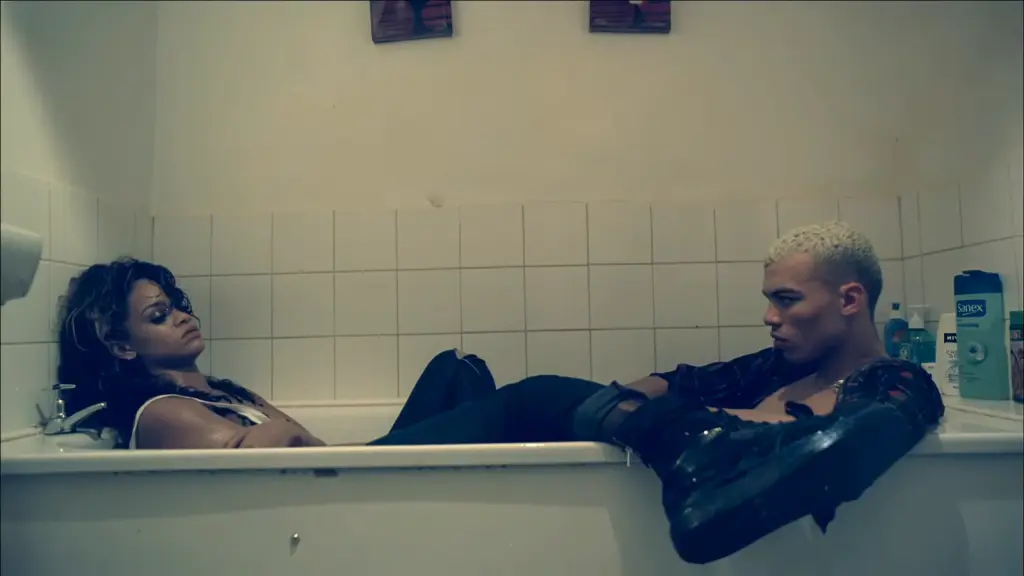 Rihanna and Dudley O’Shaughnessy in the bathtub scene from the We Found Love music video
