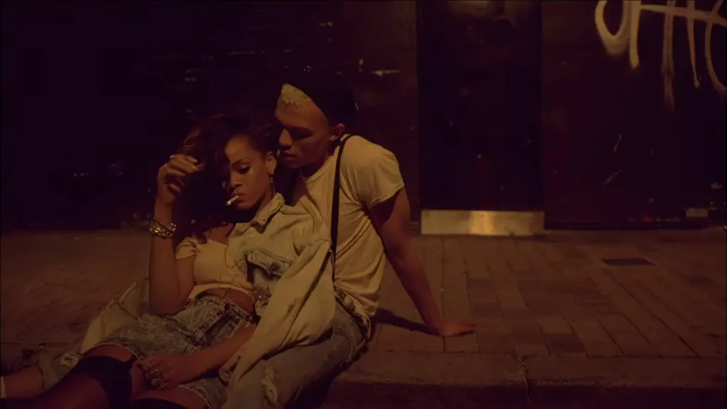 Rihanna and Dudley O’Shaughnessy together at night in the We Found Love music video