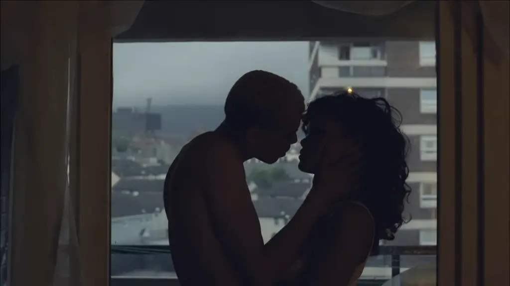 Rihanna and Dudley O’Shaughnessy silhouetted together in the We Found Love music video