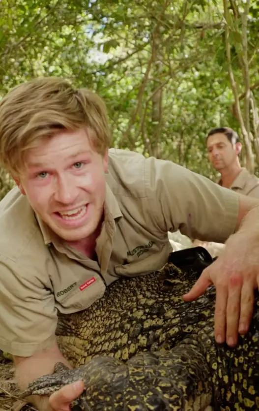 Robert Irwin with the 12-foot saltwater crocodile named Prince William