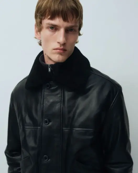 Tammo Rahming models layered ARKET Fall 2026 menswear looks