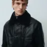 Tammo Rahming models layered ARKET Fall 2026 menswear looks