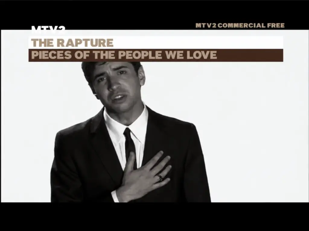 Black-and-white MTV2 broadcast frame for The Rapture’s Pieces of the People We Love.