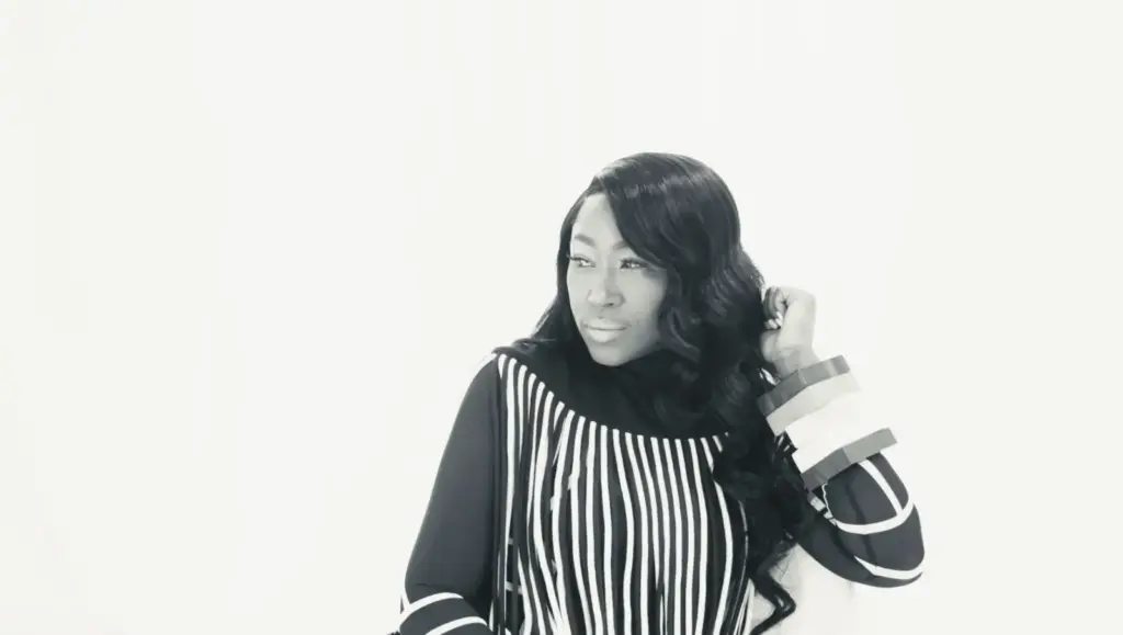 Tweet in the 2026 Love Again video