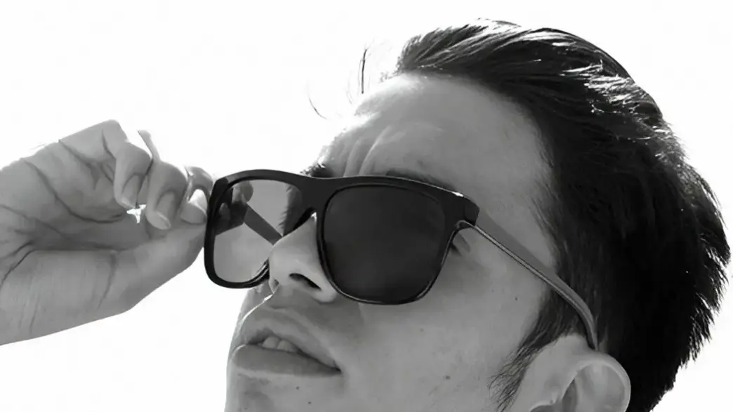 Anthony De La Cruz in a beach fashion portrait photographed by Cary James Lockwood