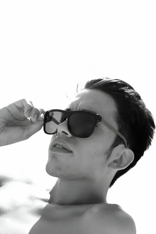Anthony De La Cruz in a beach fashion portrait photographed by Cary James Lockwood