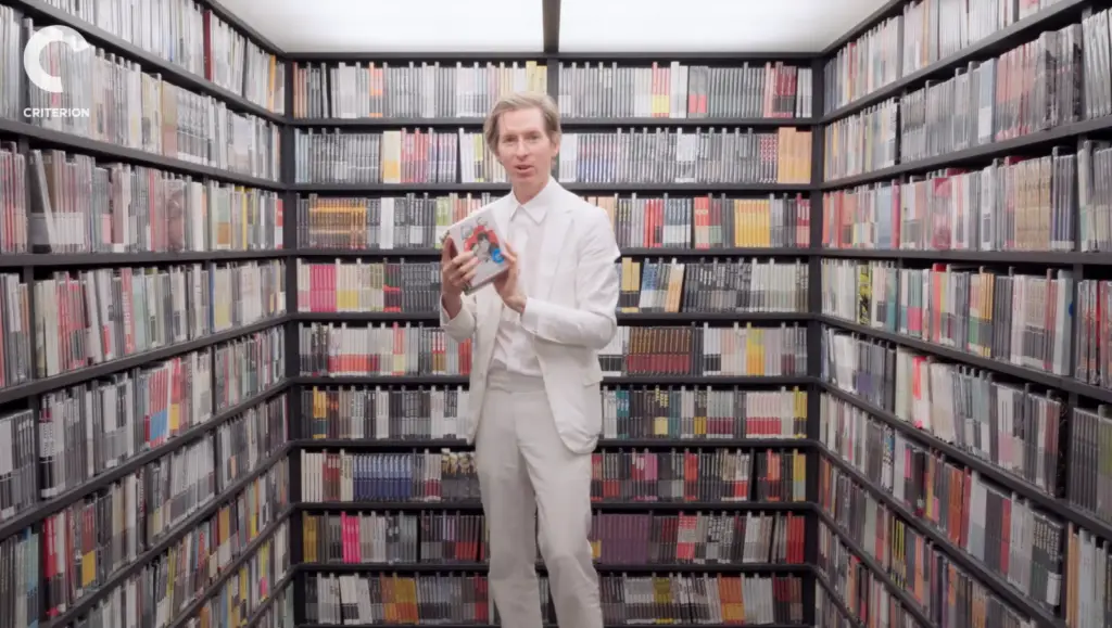Wes Anderson browsing films in the Criterion Mobile Closet