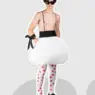 Gardouch SS27 look with oversized blue shorts, white jacket and red pointed hat from The Rings of Saturn Part 2